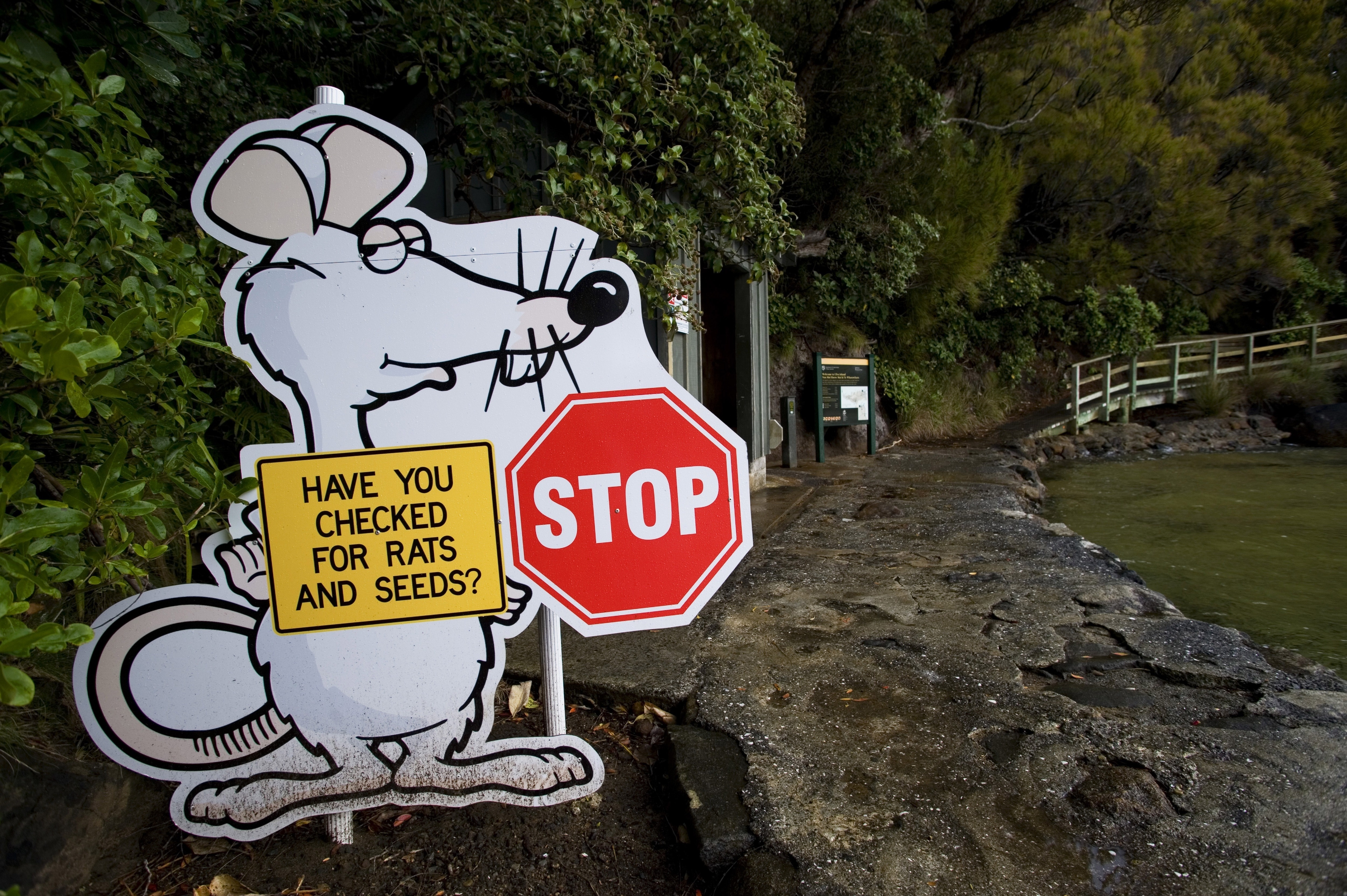At Ulva Island Bird Sanctuary on Stewart Island, New Zealand, a sign warned visitors in 2008 to check their bags. The fight against invasive predators continues. (LightRocket via Getty Images)