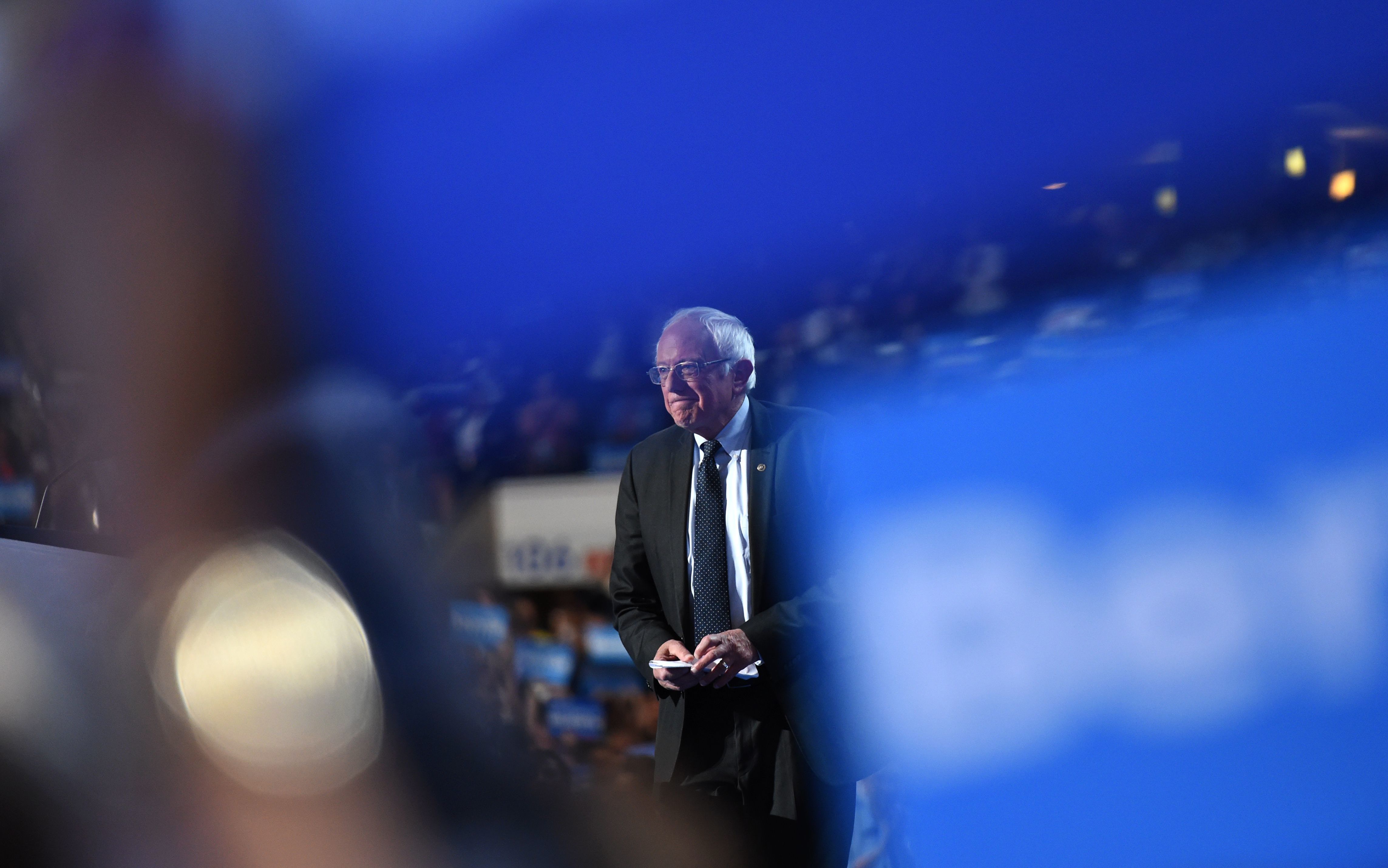Sen. Bernie Sanders takes the stage on the first evening of the Democratic National Convention in Philadelphia on Monday. (AFP/Getty Images)