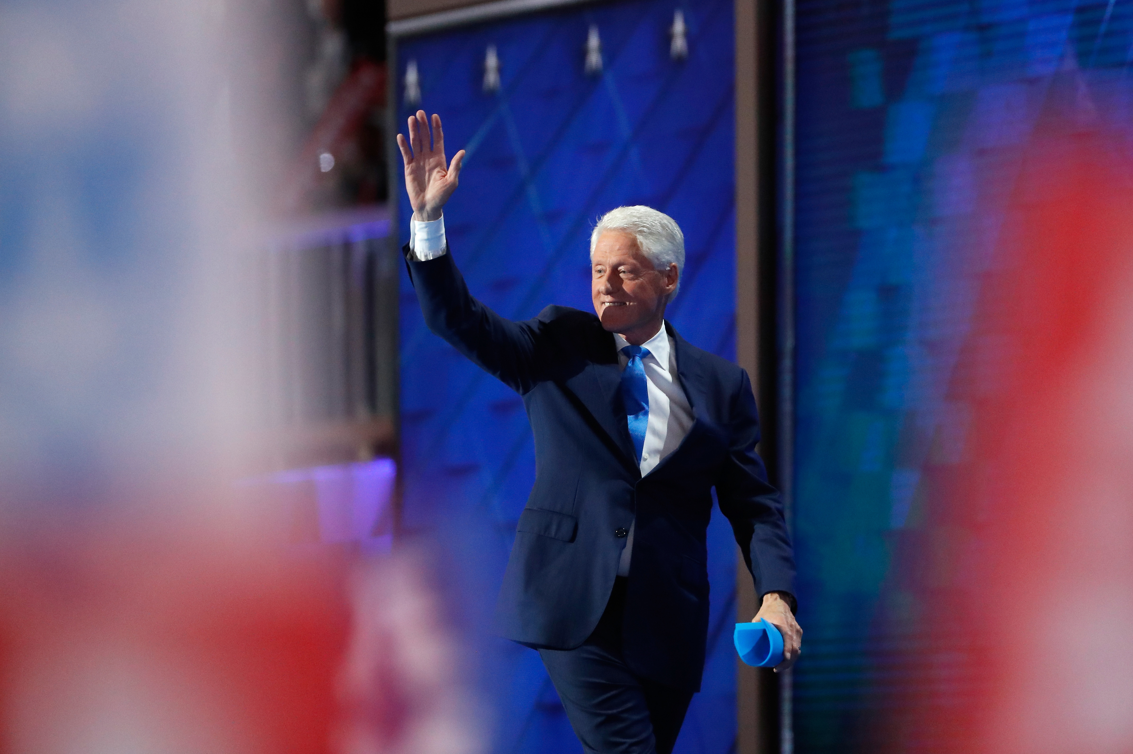 Former President Bill Clinton walks off stage after delivering remarks at the Democratic National Convention in Philadelphia on Tuesday. (Getty Images)