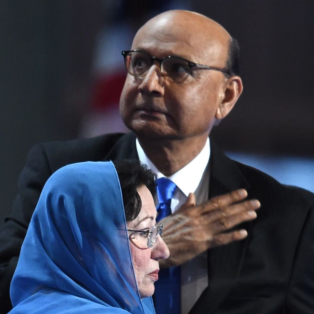 Khizr Khan, father of Humayun Khan, who was killed while serving in Iraq with the U.S. Army, gestures as his wife looks on during the final evening of the Democratic National Convention. Khizr Khan, father of Humayun Khan, who was killed while serving in Iraq with the U.S. Army, gestures as his wife looks on during the final evening of the Democratic National Convention.