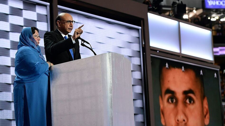 Khizr Khan, whose son was killed in Iraq, speaks directly to Donald Trump at the Democratic National Convention in Philadelphia on Thursday. His wife Ghazala Khan stands beside him. (Robyn Beck/AFP/Getty Images)