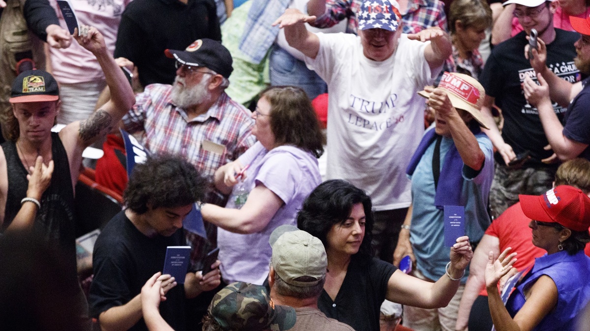 A group of protesters hold up copies of the Constitution as Republican presidential candidate Donald Trump speaks during a campaign rally Thursday in Portland, Maine. A group of protesters hold up copies of the Constitution as Republican presidential candidate Donald Trump speaks during a campaign rally Thursday in Portland, Maine.