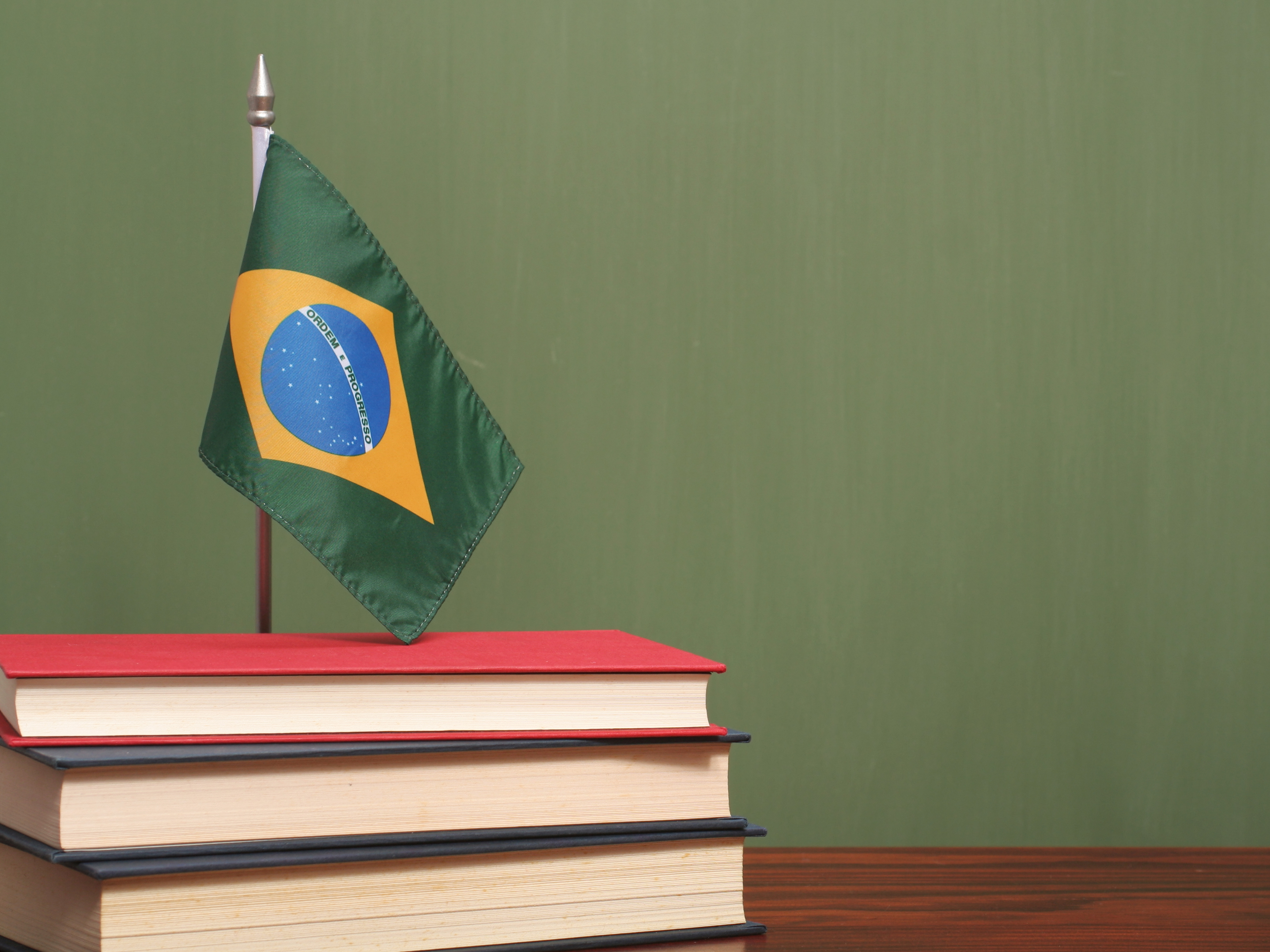 Books and flag of Brazil.