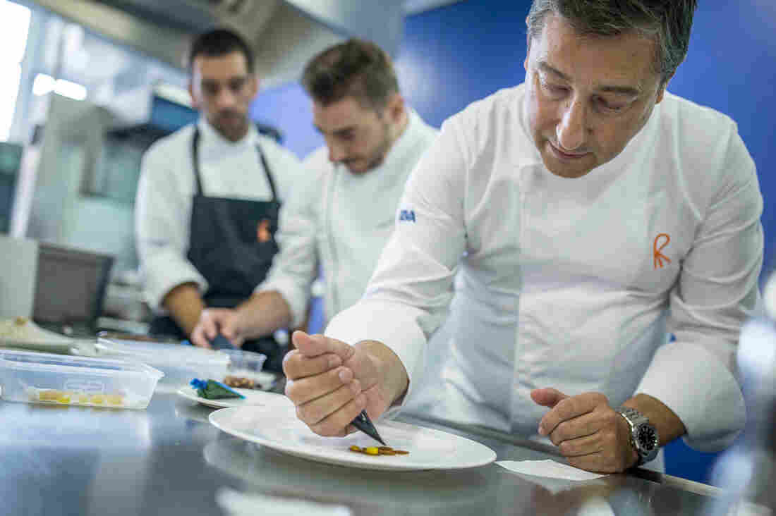 Joan Roca (foreground), head chef at El Celler de Can Roca, a top-rated restaurant in northeast Spain. Here Roca conducts a cooking demonstration at Westminster Kingsway College, in London. Joan Roca (foreground), head chef at El Celler de Can Roca, a top-rated restaurant in northeast Spain. Here Roca conducts a cooking demonstration at Westminster Kingsway College, in London.