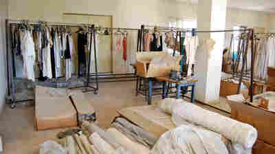 The lingerie factory was opened in the West Bank in the 1980s in an attempt to develop the Palestinian economy. The factory was shut in 1990 amid bouts of West Bank violence and troubles with Israeli military regulations. Racks of robes and camisoles still hang in the production room.