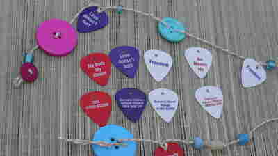 At one of England's major music festivals, The Isle of Wight Council staffs an informational tent where festival goers can learn about recognizing and reporting sexual assault.