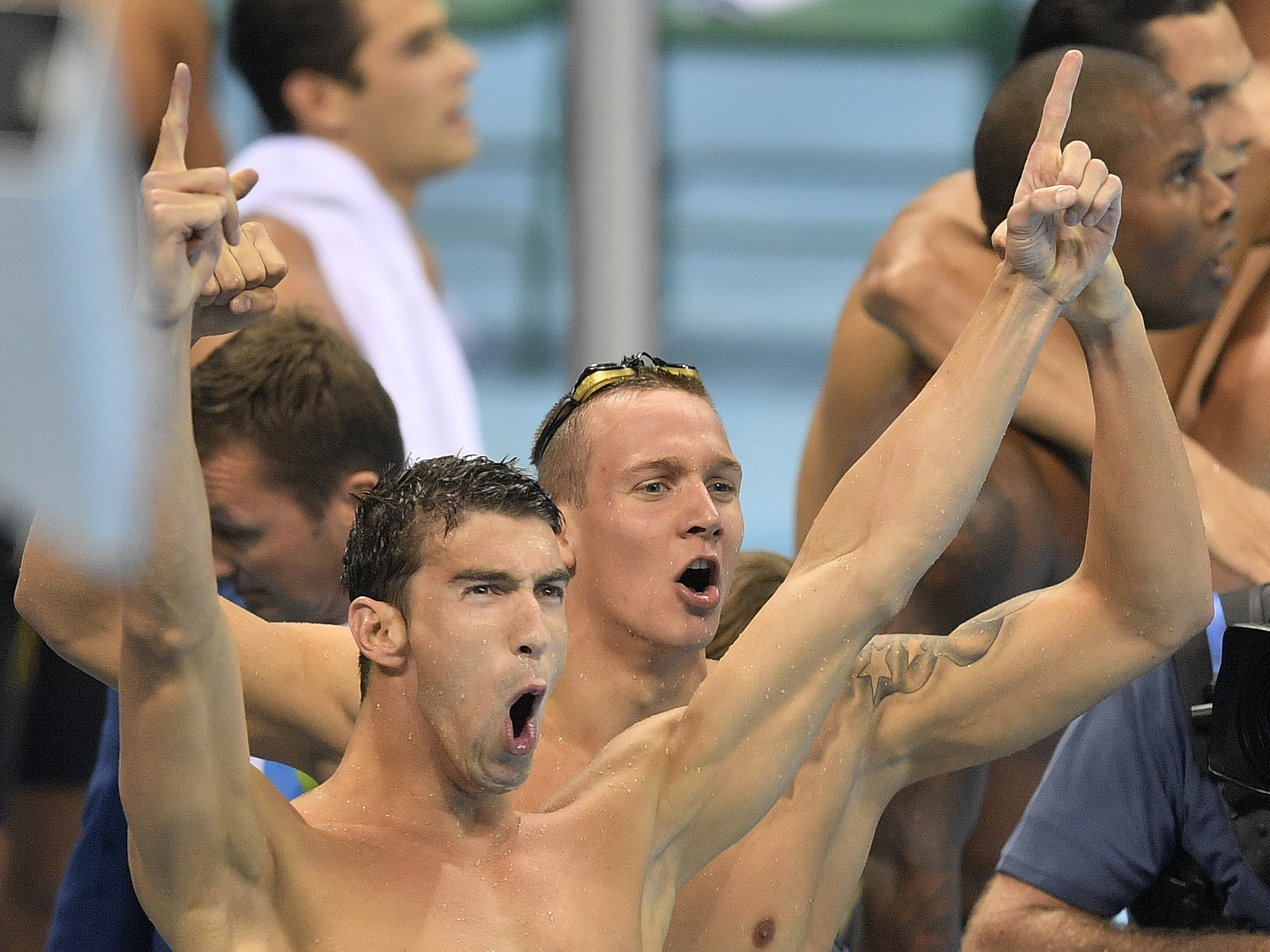 United States' Michael Phelps celebrates as his team wins the gold medal in the men's 4x100-meter freestyle final during the swimming competitions at the 2016 Summer Olympics, Sunday in Rio de Janeiro, Brazil.
