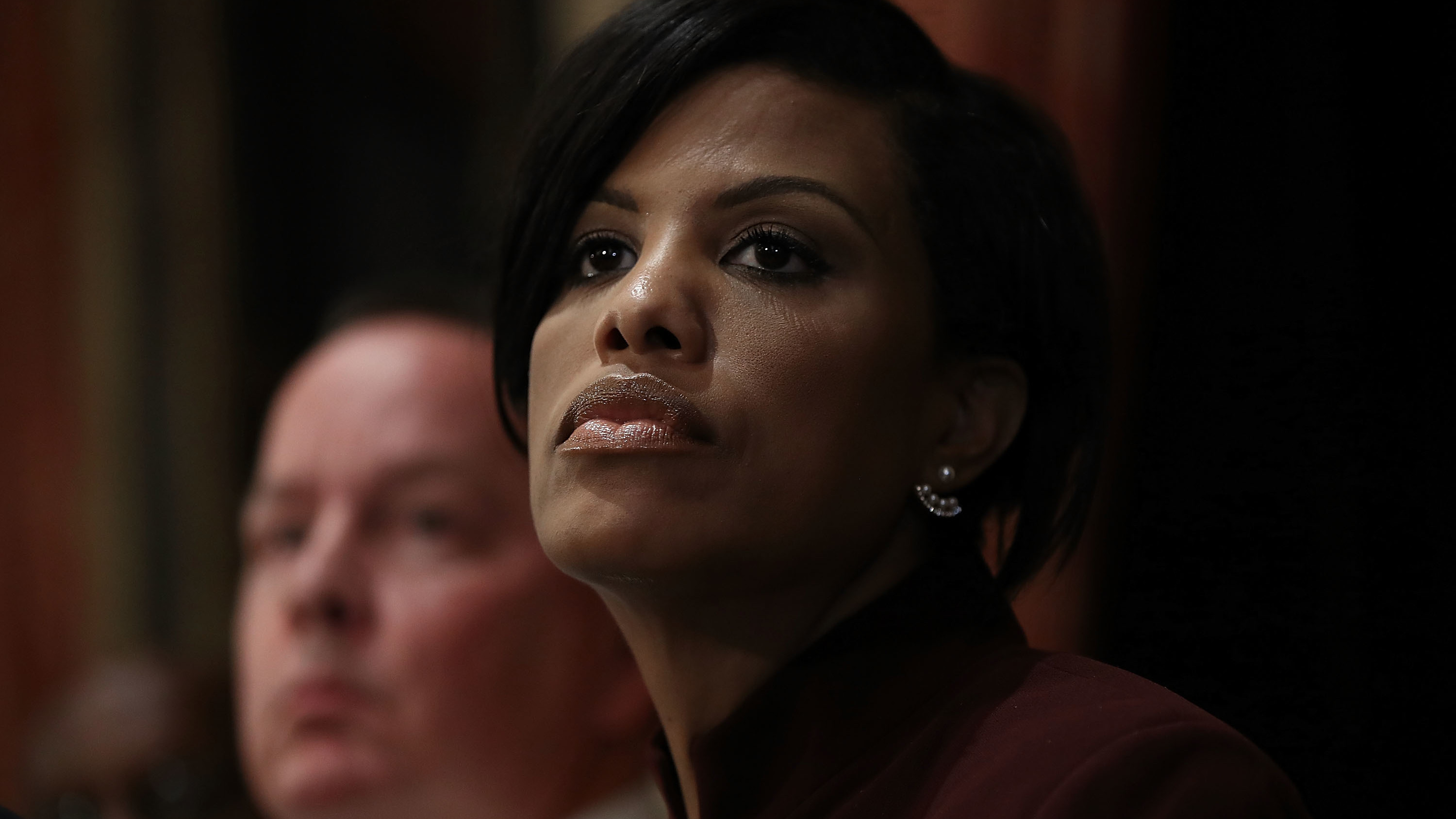 Baltimore Mayor Stephanie Rawlings-Blake  and Baltimore Police Department Commissioner Kevin Davis listen to a question during a press conference at City Hall on Wednesday.