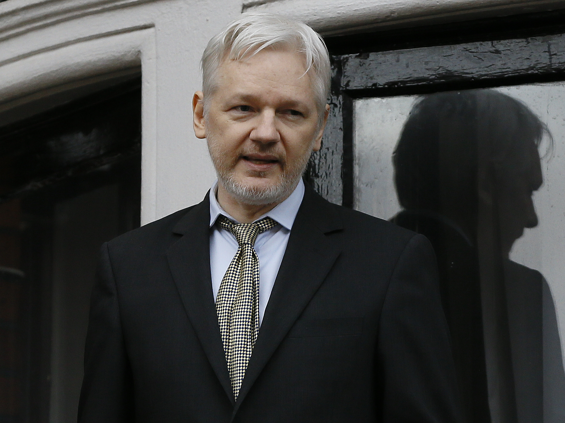 Wikileaks founder Julian Assange speaks from the balcony of the Ecuadorean Embassy in London in February 2015.