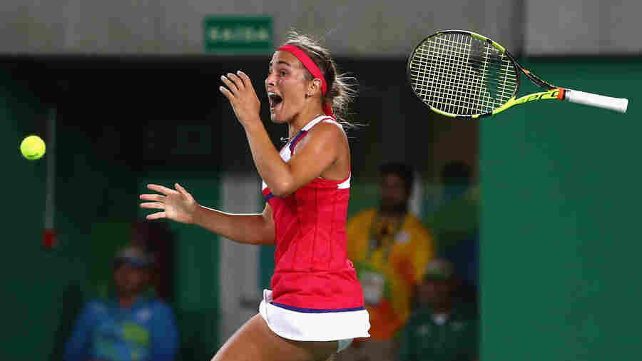 Monica Puig of Puerto Rico reacts after defeating Angelique Kerber of Germany in the women's singles gold medal match at the Rio Summer Olympics.
