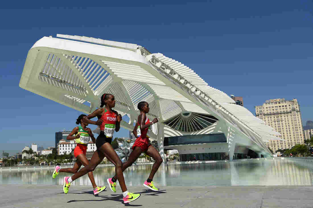 Kenya's Jemima Sumgong (center) won the women's marathon Sunday in Rio. Bahrain's Eunice Kirwa (right) won silver, while Ethiopia's Mare Dibaba finished third. While Kenyan women have often medaled, Sumgong was the first from her country to win the event.