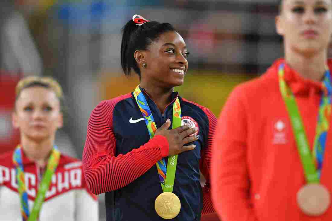 Russia's Maria Paseka (left), Simone Biles and Switzerland's Giulia Steingruber stand on the medal podium for the women's vault event final of the Artistic Gymnastics. Simone Biles won the women's vault final in the Rio Olympic Arena, setting a new mark for wins in a single Olympics by an American woman.