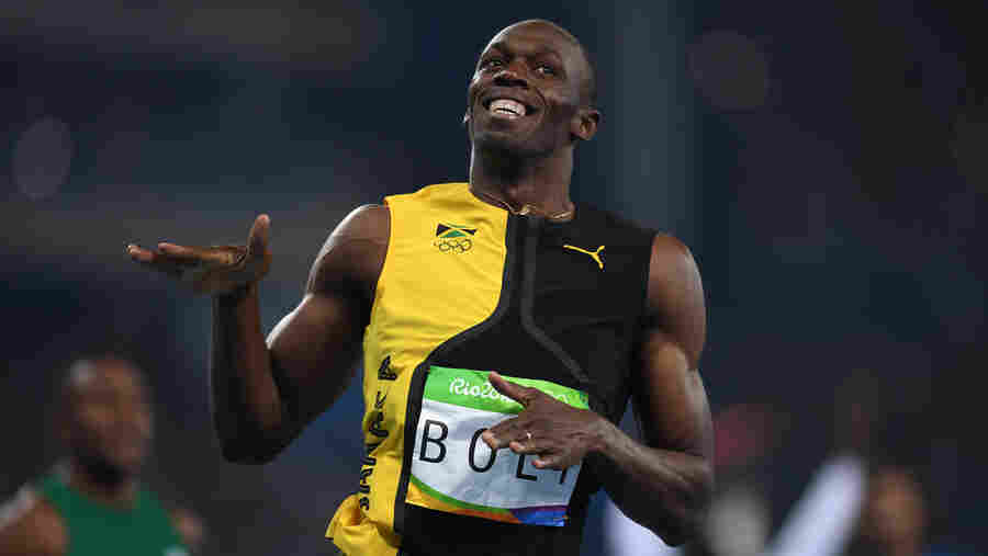 Usain Bolt of Jamaica wins the 100-meter final in 9.81 on Sunday, becoming the first man to ever win the race in three straight Olympics.