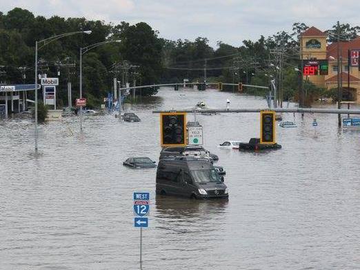 Flooding can be seen on O'Neal Lane, looking north from I-12 in Baton Rouge, La.