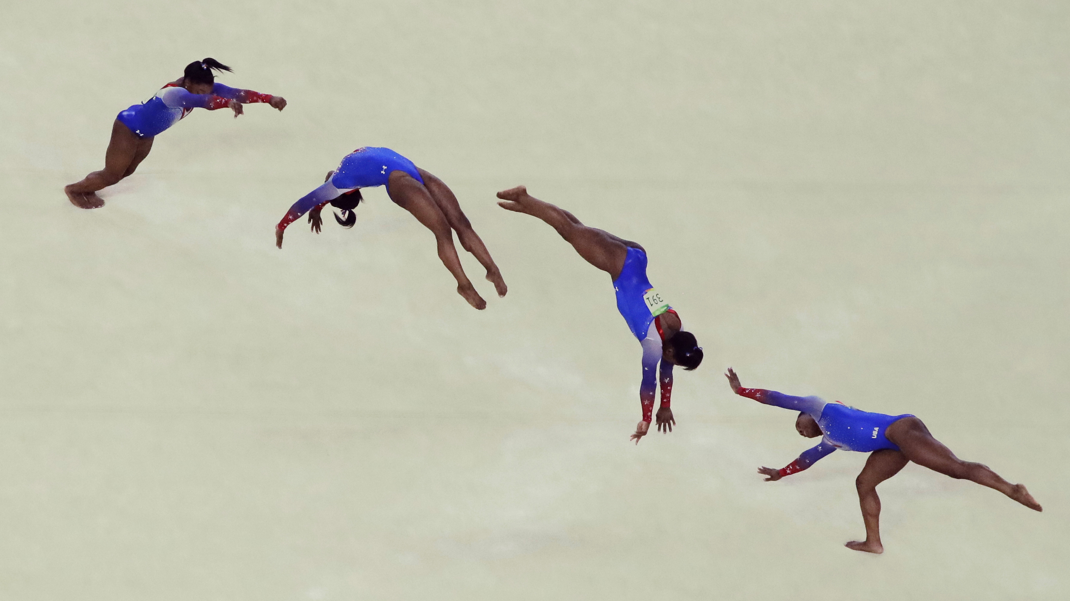 In this multiple exposure photo, Simone Biles performs in the floor exercise, where she won gold in Rio on Tuesday. Biles won four golds and a bronze overall, the best Olympic performance ever by an American gymnast.