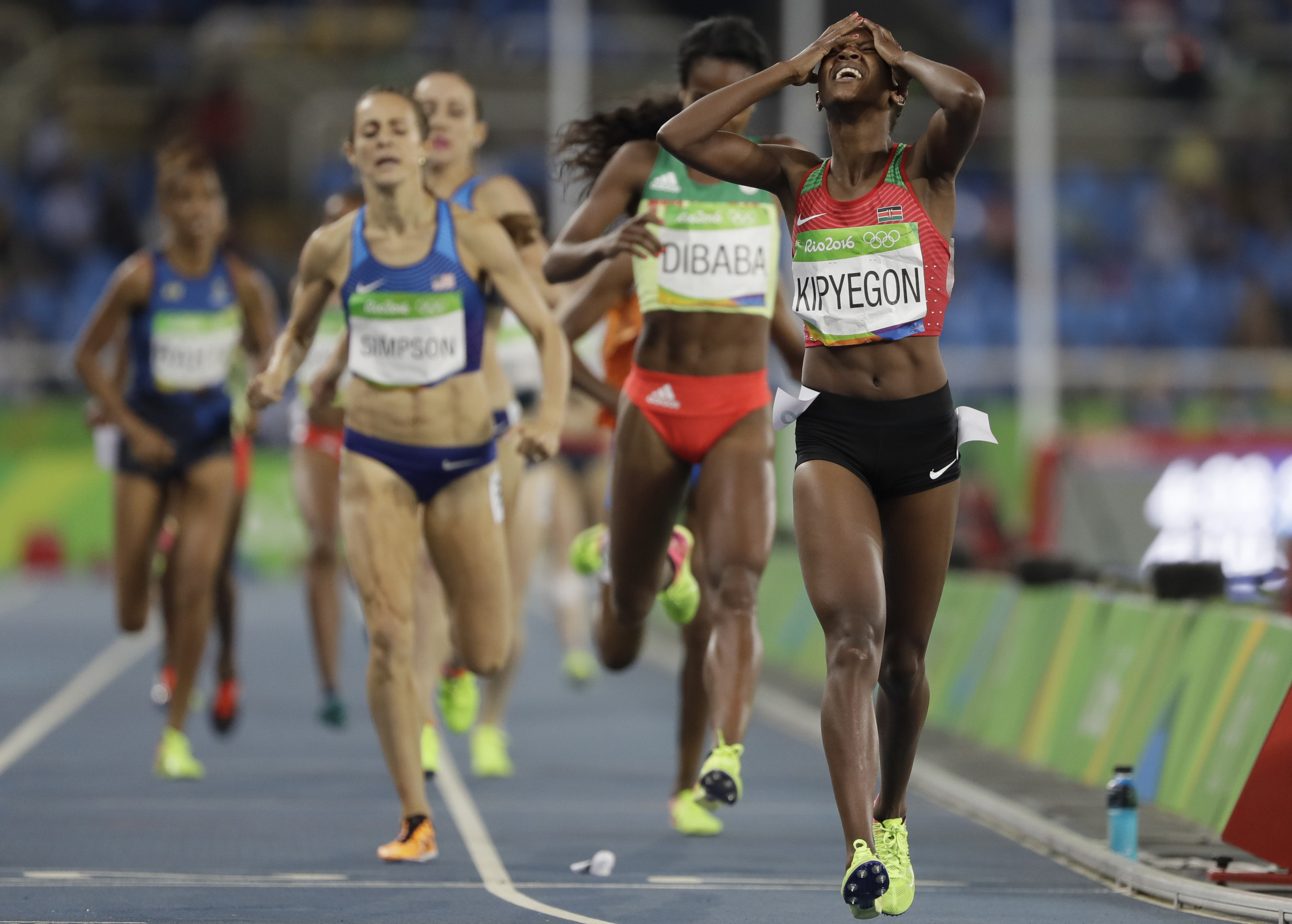 Kenya's Faith Kipyegon crosses the line to win the women's 1,500 meters. Kenya has won three distance races in the past three days.
