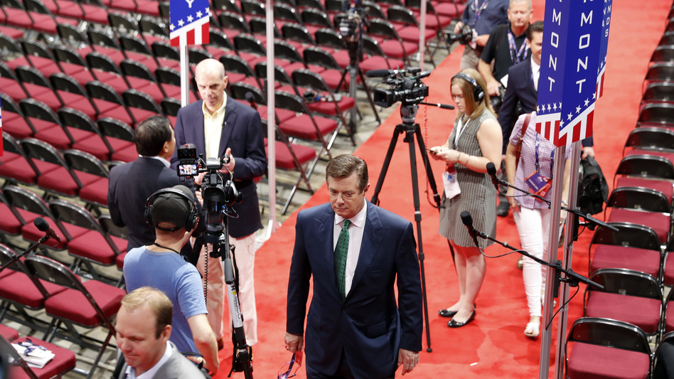 Trump campaign Chairman Paul Manafort walks off the floor of the Republican National Convention last month after talking to reporters. (Carolyn Kaster/AP)