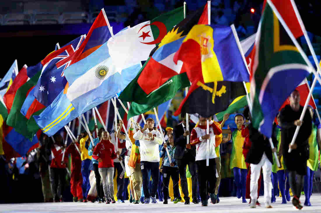 Athletes walk during the "Heroes of the Games" segment during the Closing Ceremony of the Rio 2016 Olympic Games at Maracana Stadium on Sunday in Rio de Janeiro, Brazil.