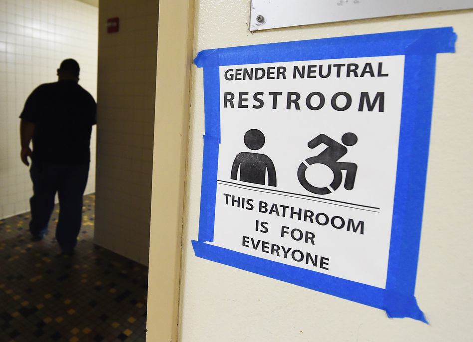 Signs are posted outside Santee High School's gender neutral restrooms at its campus in Los Angeles on May 4. (Mark Ralston/AFP/Getty Images)