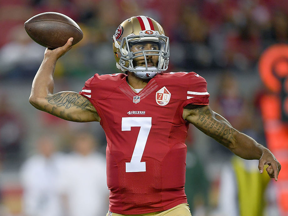Quarterback Colin Kaepernick of the San Francisco 49ers throws a pass against the Green Bay Packers in the first half of their preseason football game on Friday in Santa Clara, California. (Getty Images)