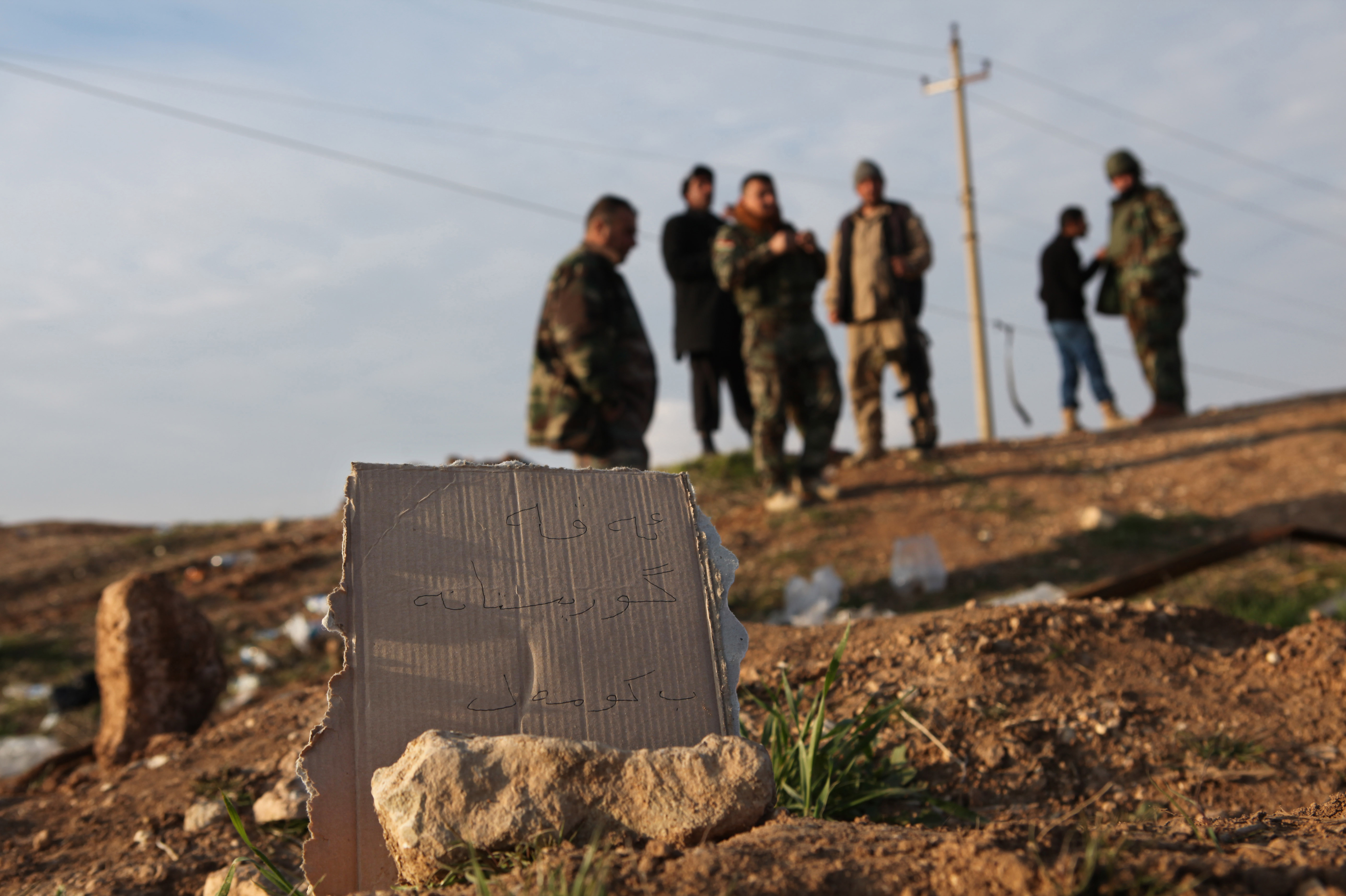 ISIS buried thousands in 72 mass graves