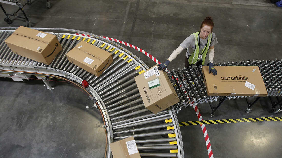 A worker sorts packages at an Amazon.com fulfillment center. In 2016, women earned 81.8 percent of what men earned on a weekly basis, according to the Bureau of Labor Statistics.