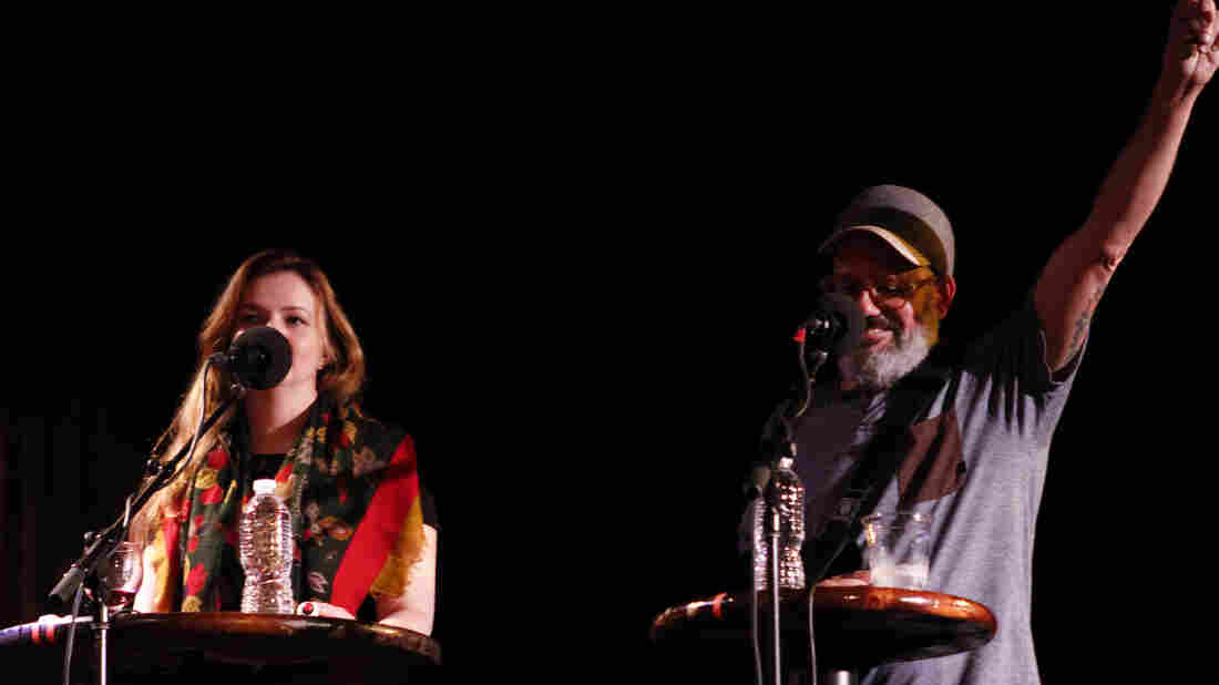 David Cross and wife Amber Tamblyn appear on the Ask Me Another stage at the Bell House in Brooklyn, New York.