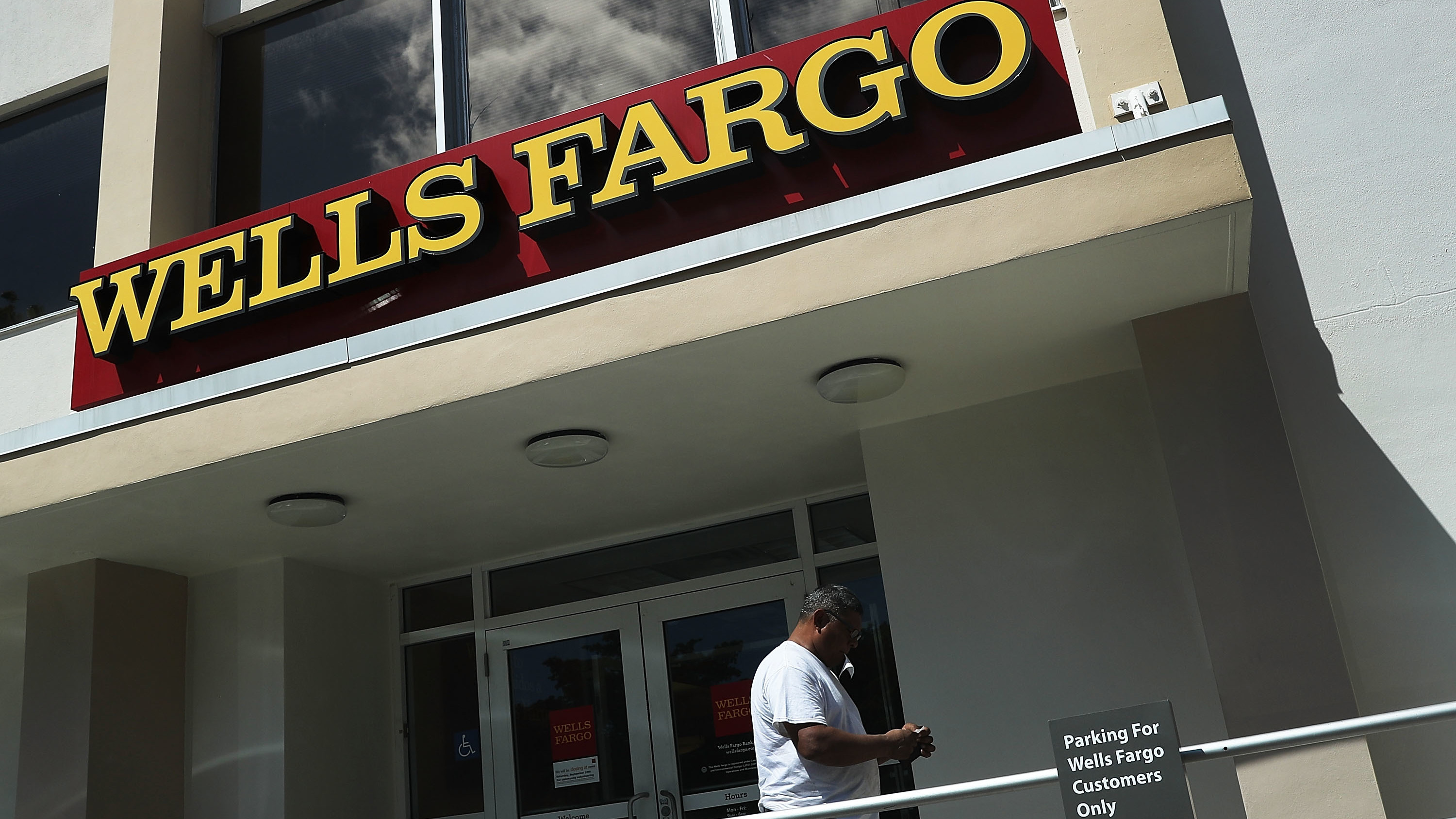 A Wells Fargo executive's departure with large stock and options holdings has sparked questions, after the division she ran incurred $185 million in penalties. (Getty Images)