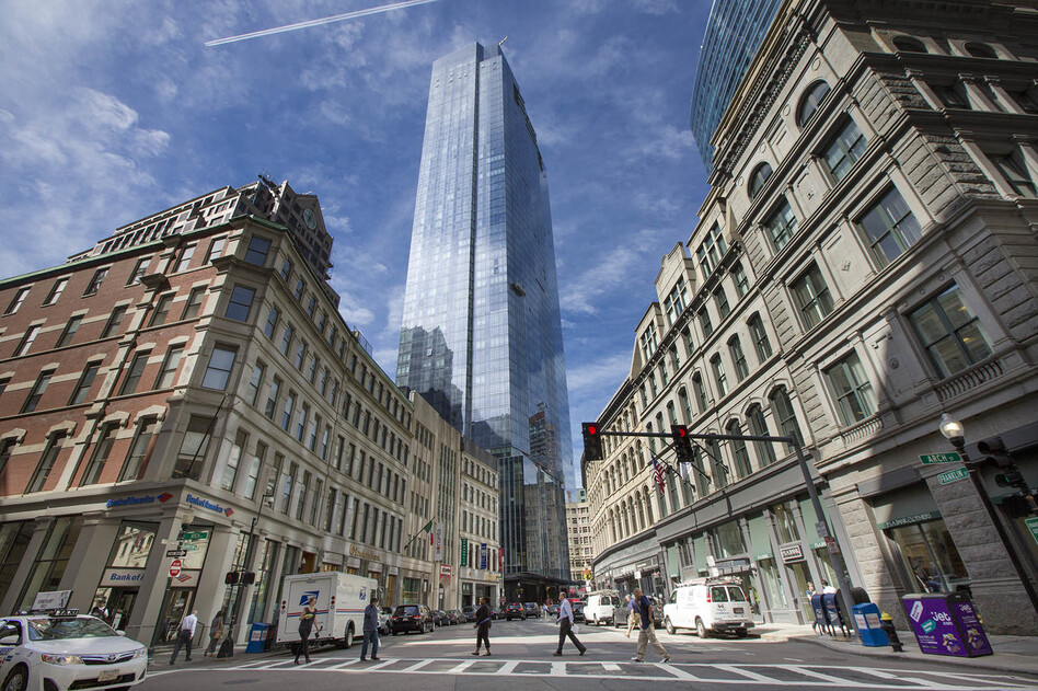 The Millennium Tower looking down Franklin Street in downtown Boston. The city has seen a tech boom and housing prices have also increased over the past few years. (Jesse Costa/WBUR)