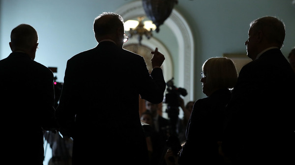 Senate Minority Leader Harry Reid, Sen. Chuck Schumer, Sen. Patty Murray and Senate Minority Whip Richard Durbin speak at a news briefing at the Capitol on Tuesday.