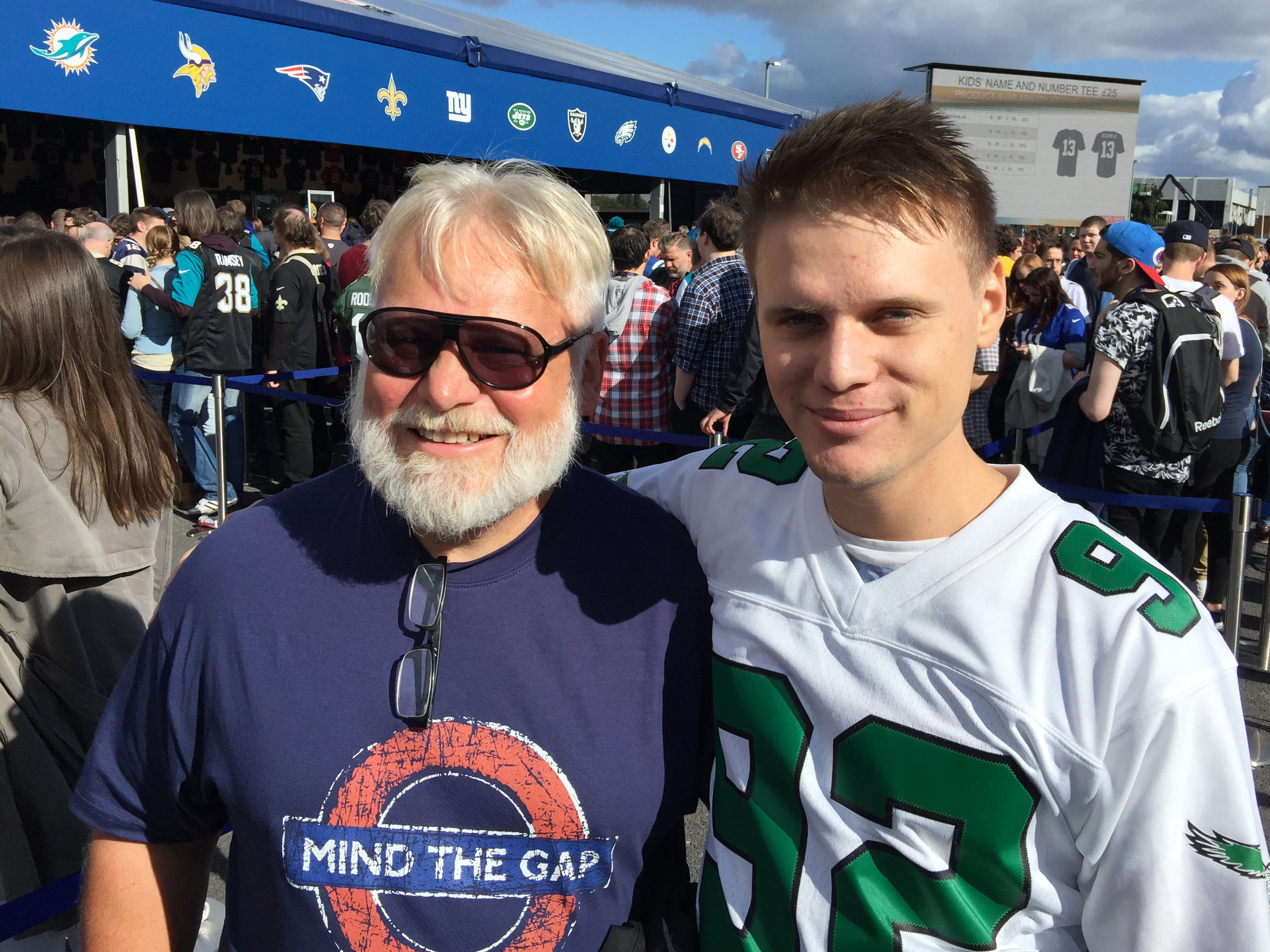 Adrian Schlauri, 24, and his father, Guido, flew into London from Zurich for Sunday's game. Adrian became a football fan while following his dad, who played in an amateur league. Adrian is wearing the vintage jersey of Hall of Fame Philadelphia Eagles defensive end Reggie White. Frank Langfitt/NPR.