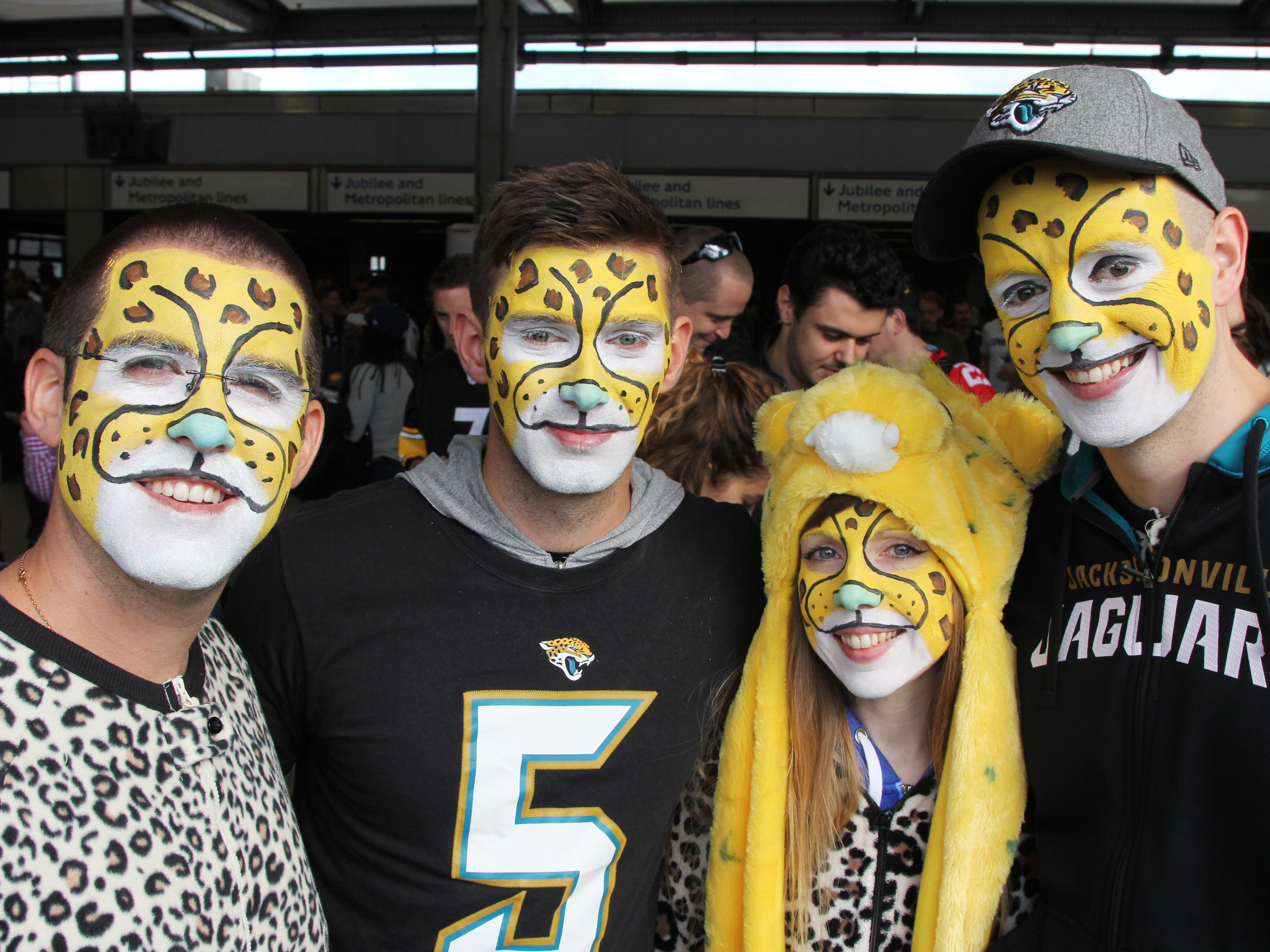 Fans from the English city of Reading don Jacksonville Jaguars onesies to cheer on the team, which has committed to playing games in London through at least 2020. Frank Langfitt/NPR.