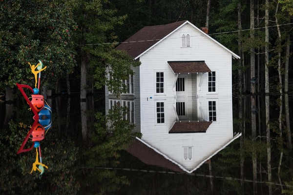 A building is inundated with floodwaters in Lumberton on Monday. Record floodwaters were rising in some areas of North Carolina.