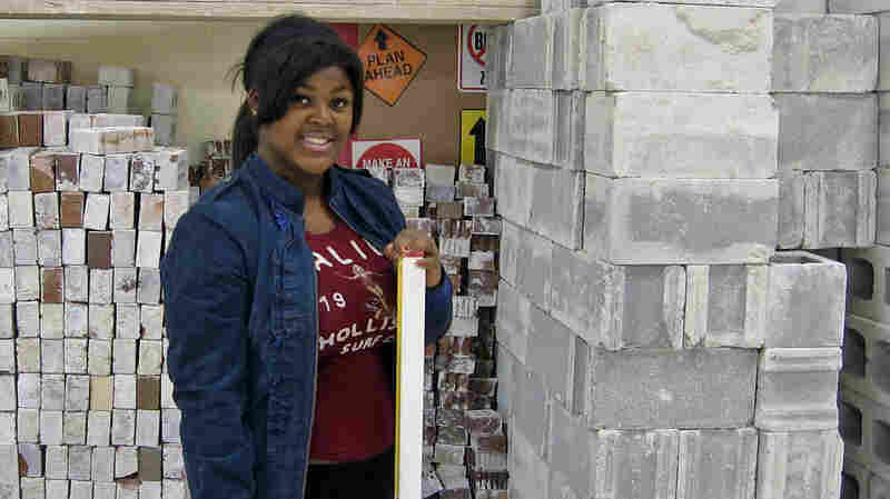 Kyrah Whatley, 17, is confident she can become a mason after finishing high school. But around the U.S., many parents think schools are not adequately preparing girls for the workforce.