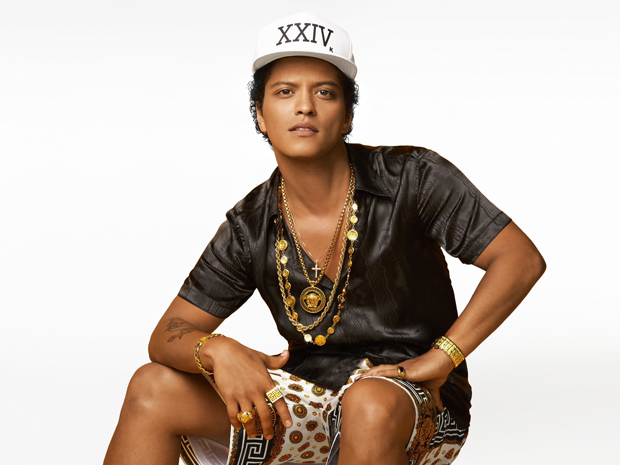 Bruno Mars has released the first single, "24K Magic," from his upcoming album of the same name.