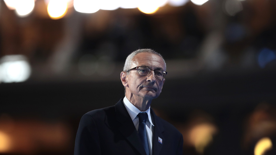 John Podesta walks off stage after delivering a speech on the first day of the Democratic National Convention July 25 in Philadelphia. (Drew Angerer/Getty Images)