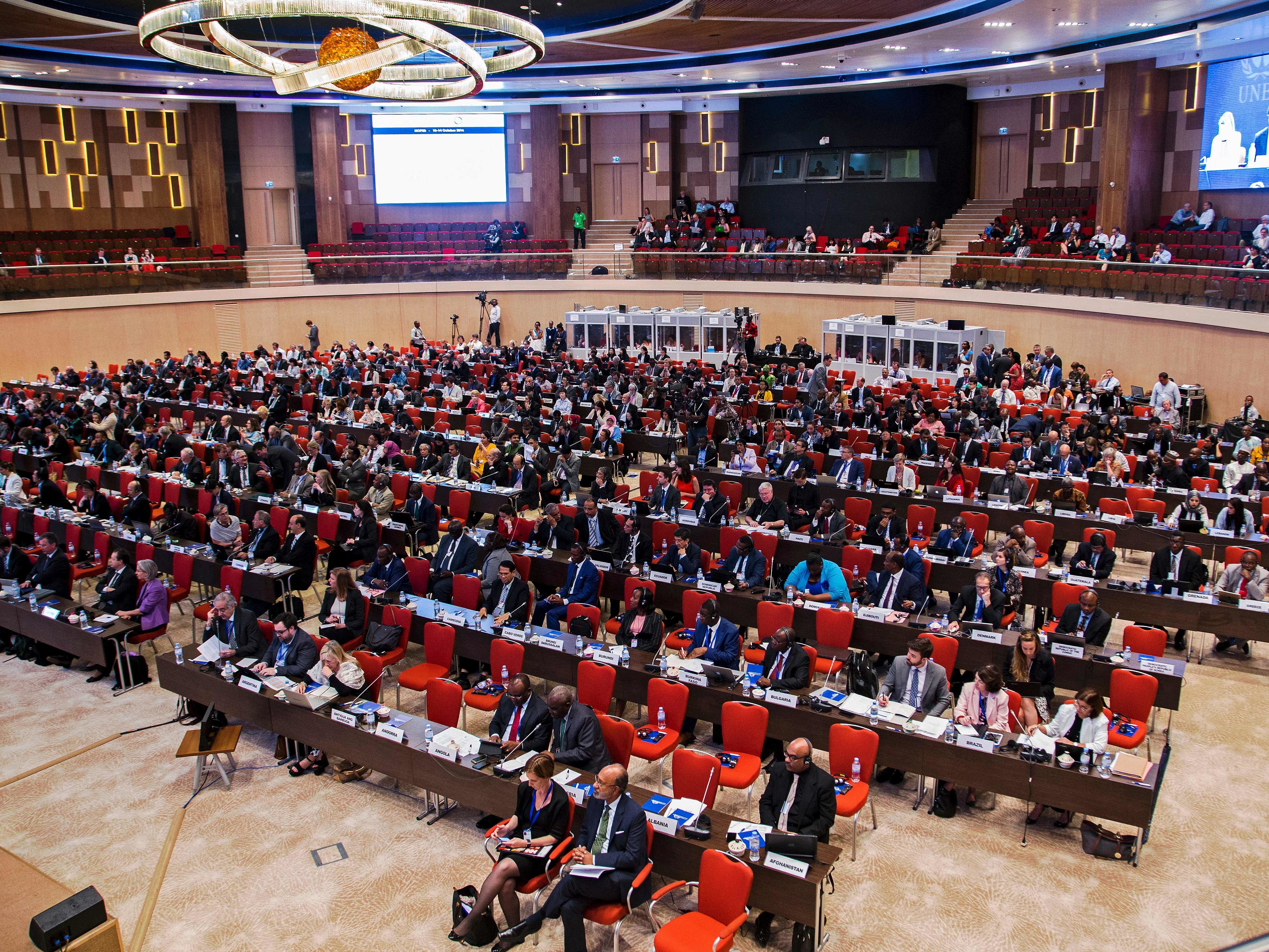 Delegates attend the official opening of the 28th meeting of the Parties to the Montreal Protocol in Kigali on October 13, 2016. Envoys from nearly 200 nations are in the Rwandan capital to thrash out an agreement to phase out hydrofluorocarbons (HFCs).