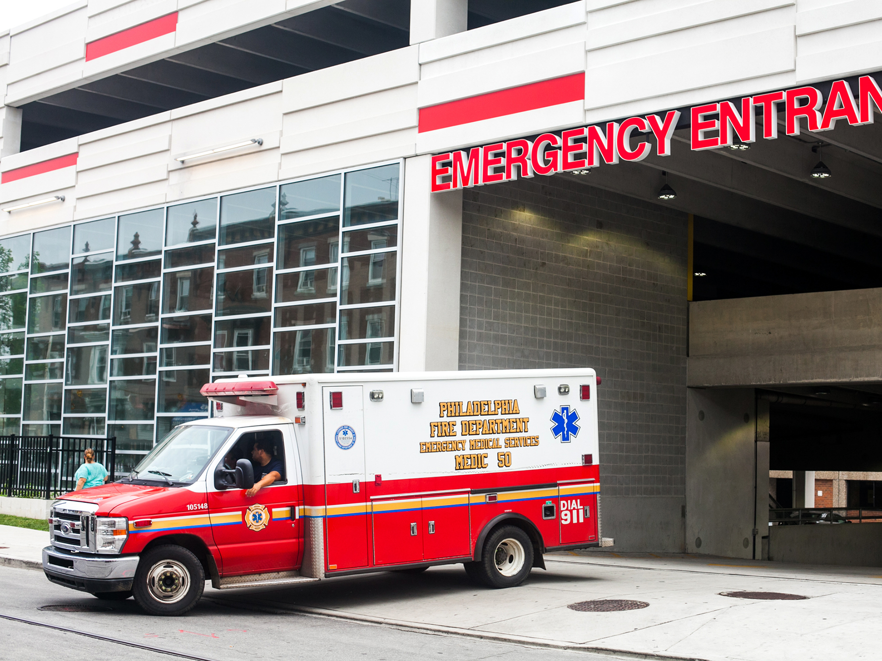 An ambulance pulls out of the emergency entrance at Temple University Hospital in North Philadelphia.