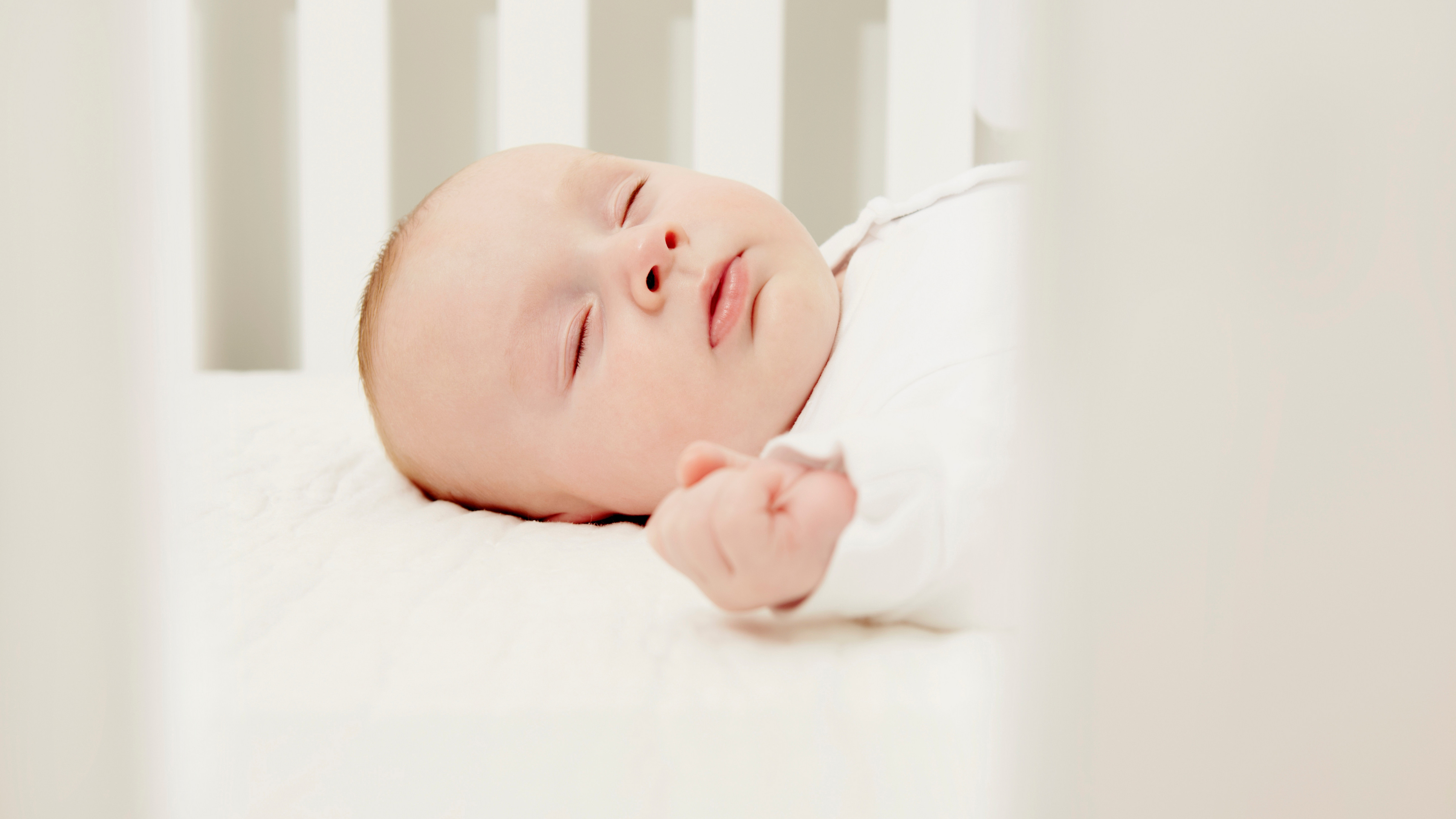 New advice from the American Academy of Pediatrics recommends that newborns sleep in their parents' rooms for at least the first 6 months to avoid SIDS. (Getty Images/Cultura RF)
