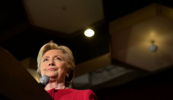 Hillary Clinton addresses an early vote rally at Broward College in Coconut Creek, Fla., on Tuesday. WikiLeaks continues to release emails hacked from the personal account of Clinton's campaign chairman, John Podesta.