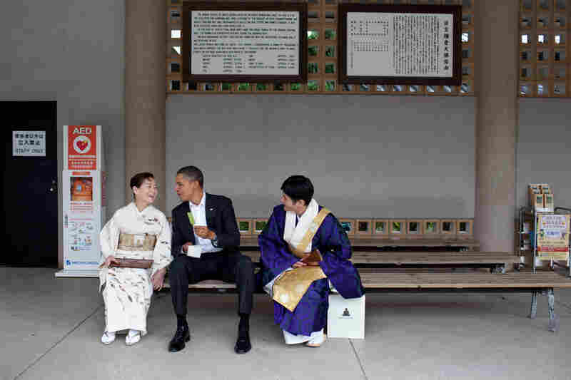 "Visiting the Great Buddha of Kamakura, in Japan, the President had a green tea ice cream bar with his hosts. He had visited this Buddha as a young child and said he remembered sitting in the exact same place having an ice cream bar," Pete Souza wrote on The White House Flickr page for this image from Obama's 2010 Japan visit.