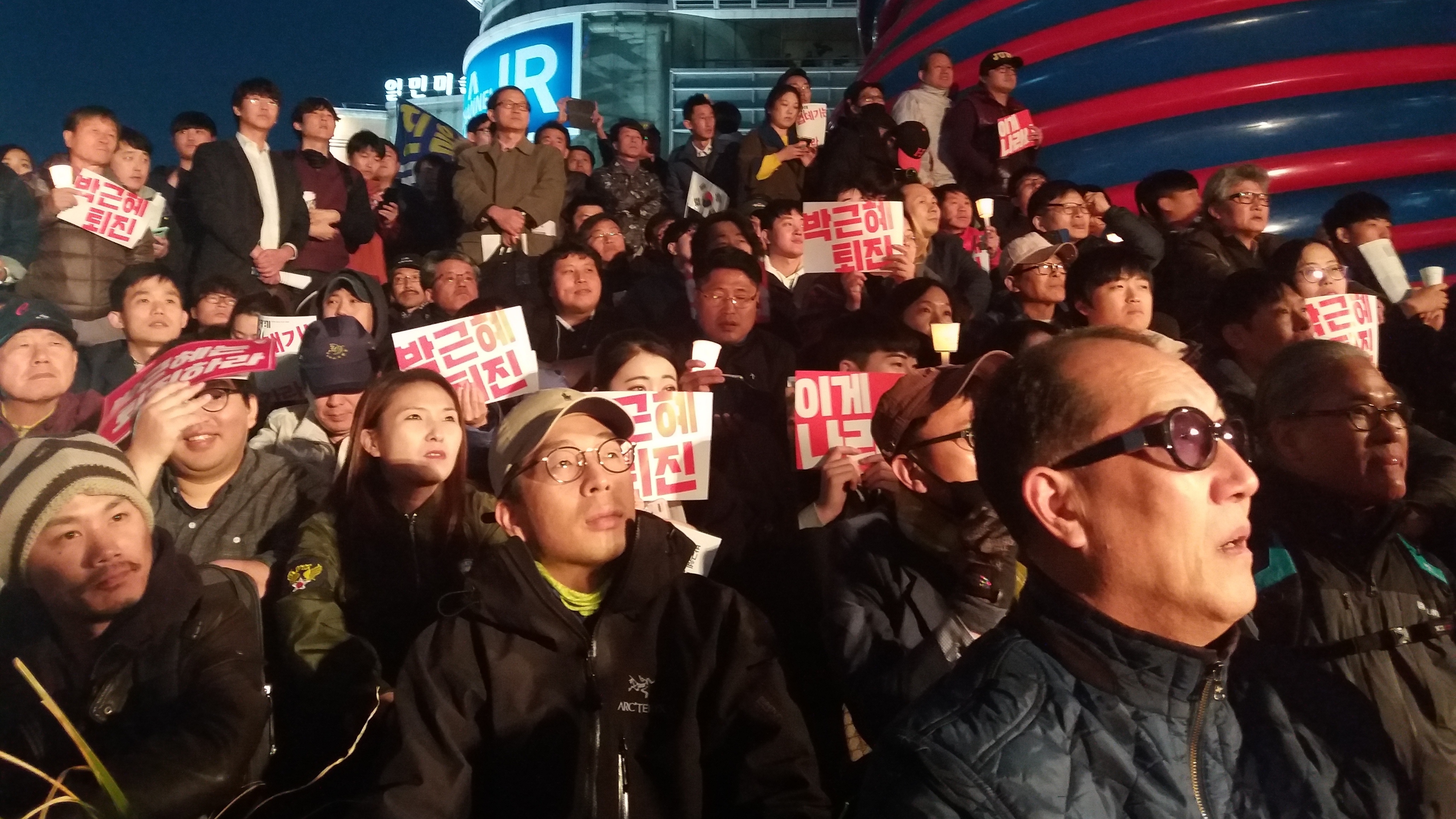 An estimated 10,000 demonstrators showed up near City Hall in Seoul on Saturday, calling for South Korean President Park Geun-hye's resignation. (For NPR)