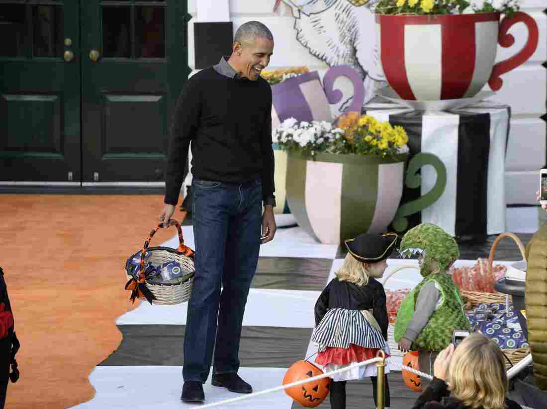 President Obama hands out treats Monday night.