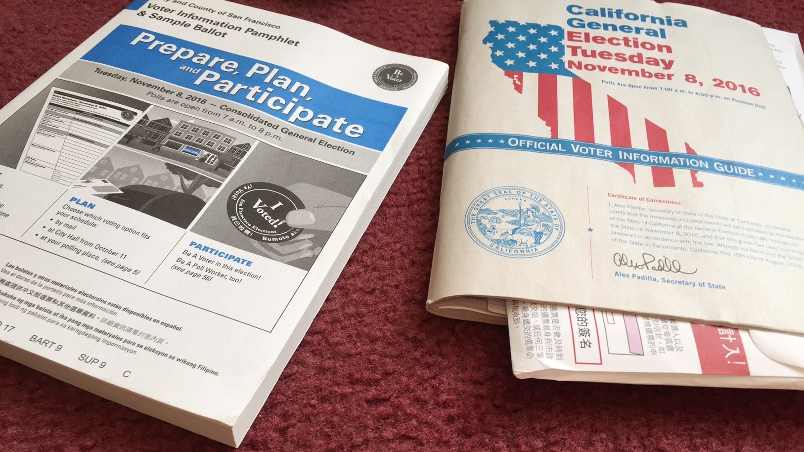The City and County of San Francisco's voter information pamphlet explains its 25 local measures and the official state of California voter information guide explains its 17 state ballot measures. (Capital Public Radio)