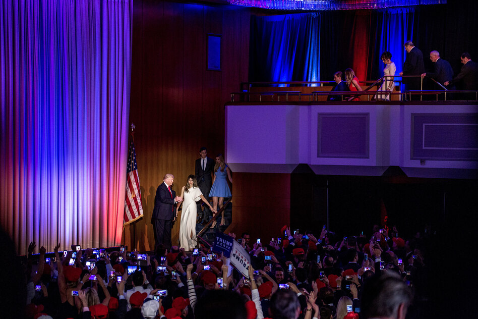 Donald Trump escorts his wife, Melania, to the stage moments before giving his acceptance speech. (Natalie Keyssar for NPR)