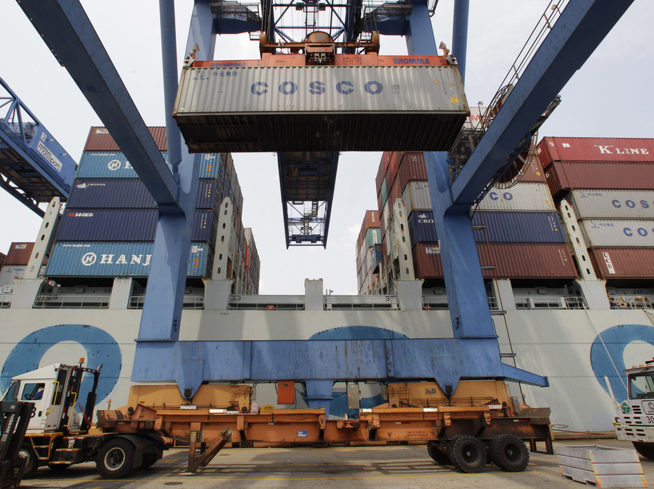A container ship from China is offloaded at Massport's Conley Terminal in the port of Boston. (Stephan Savoia/AP)
