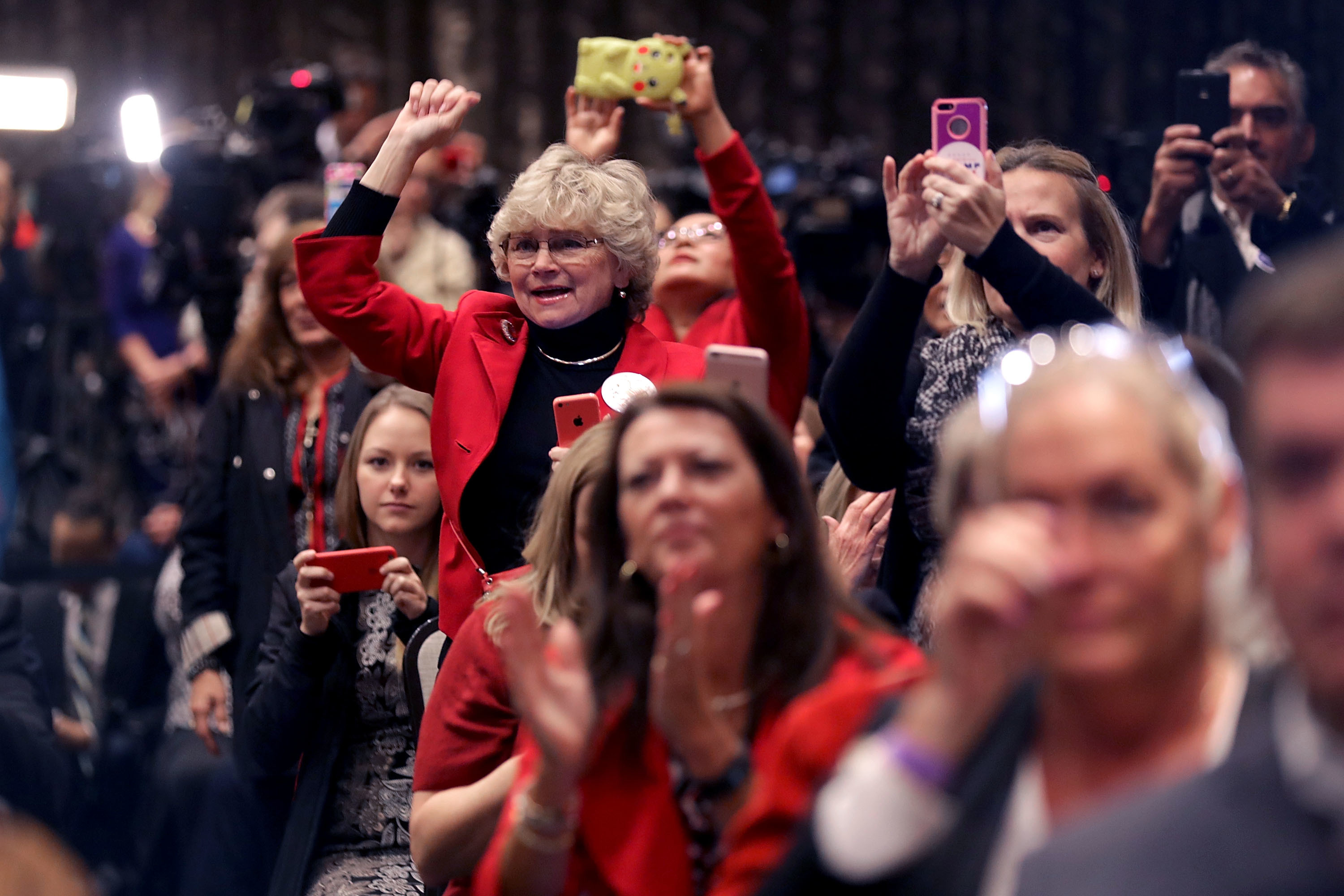 Invited guests cheer for Donald Trump during a campaign event Nov. 1 in Valley Forge, Pa. (Getty Images)