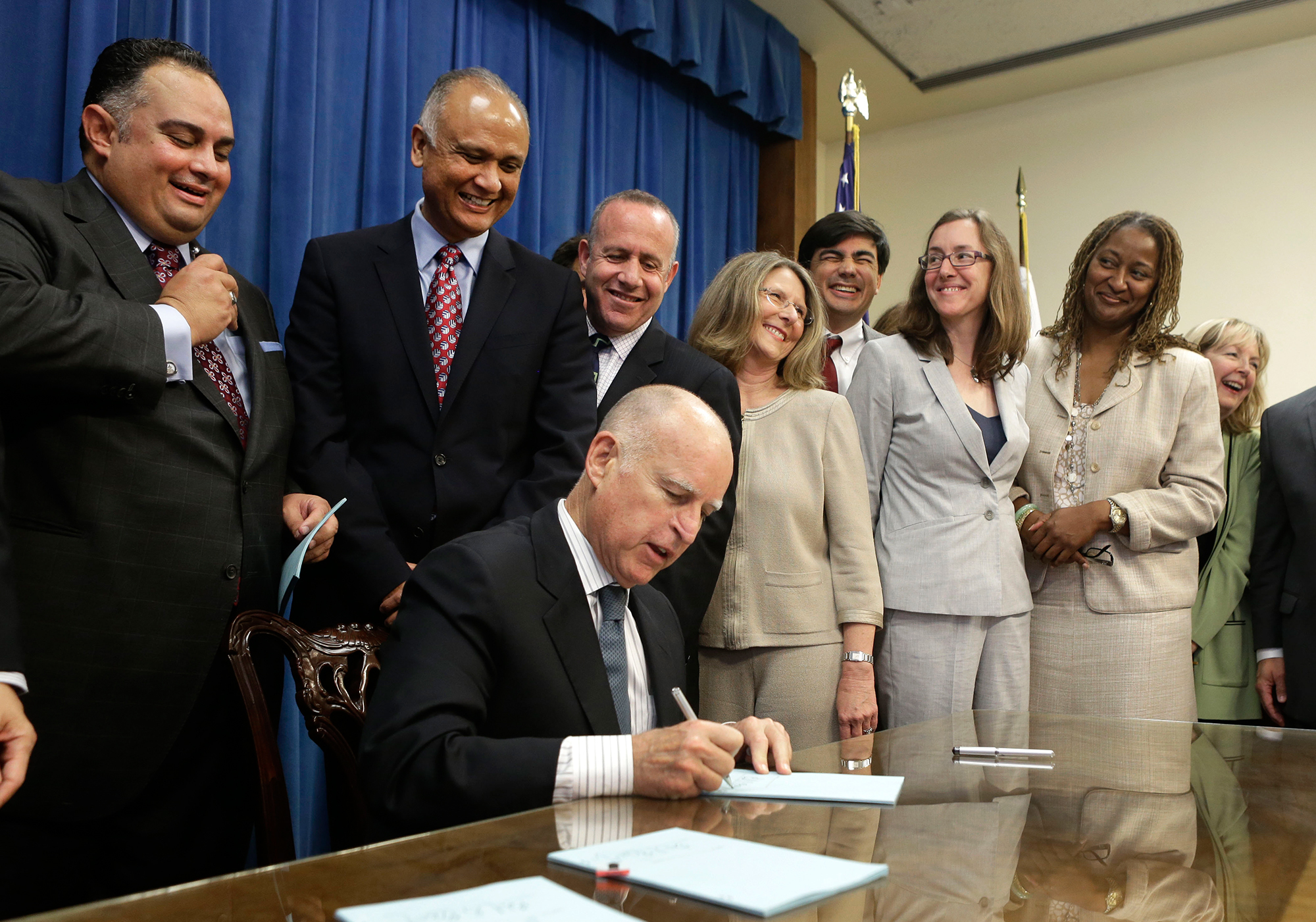 California Gov. Jerry Brown signed a Medicaid expansion into law as part of the state's budget authorization in 2013. (AP)