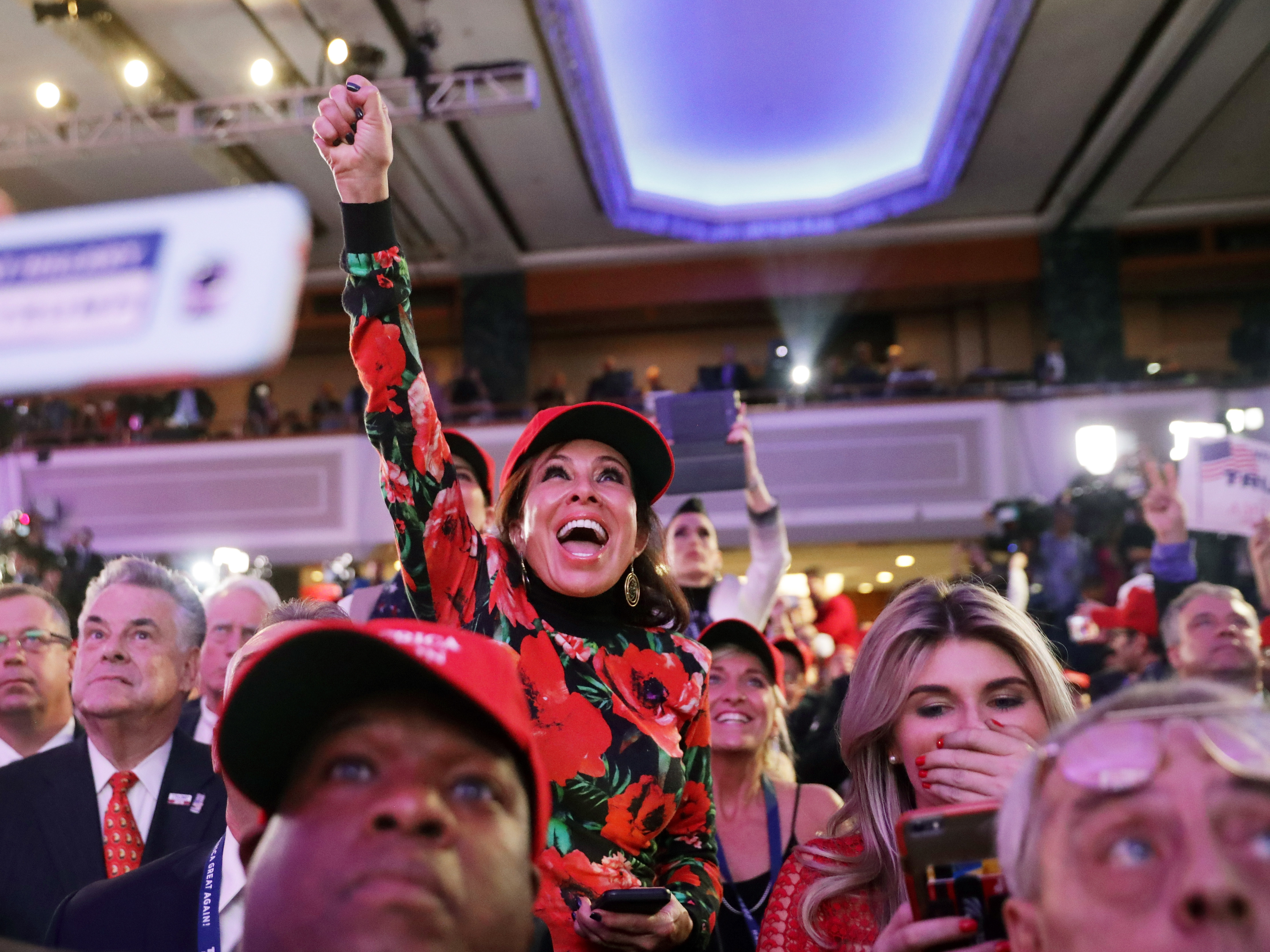 Donald Trump supporters cheer on Tuesday night at the New York Hilton Midtown. (Getty Images)