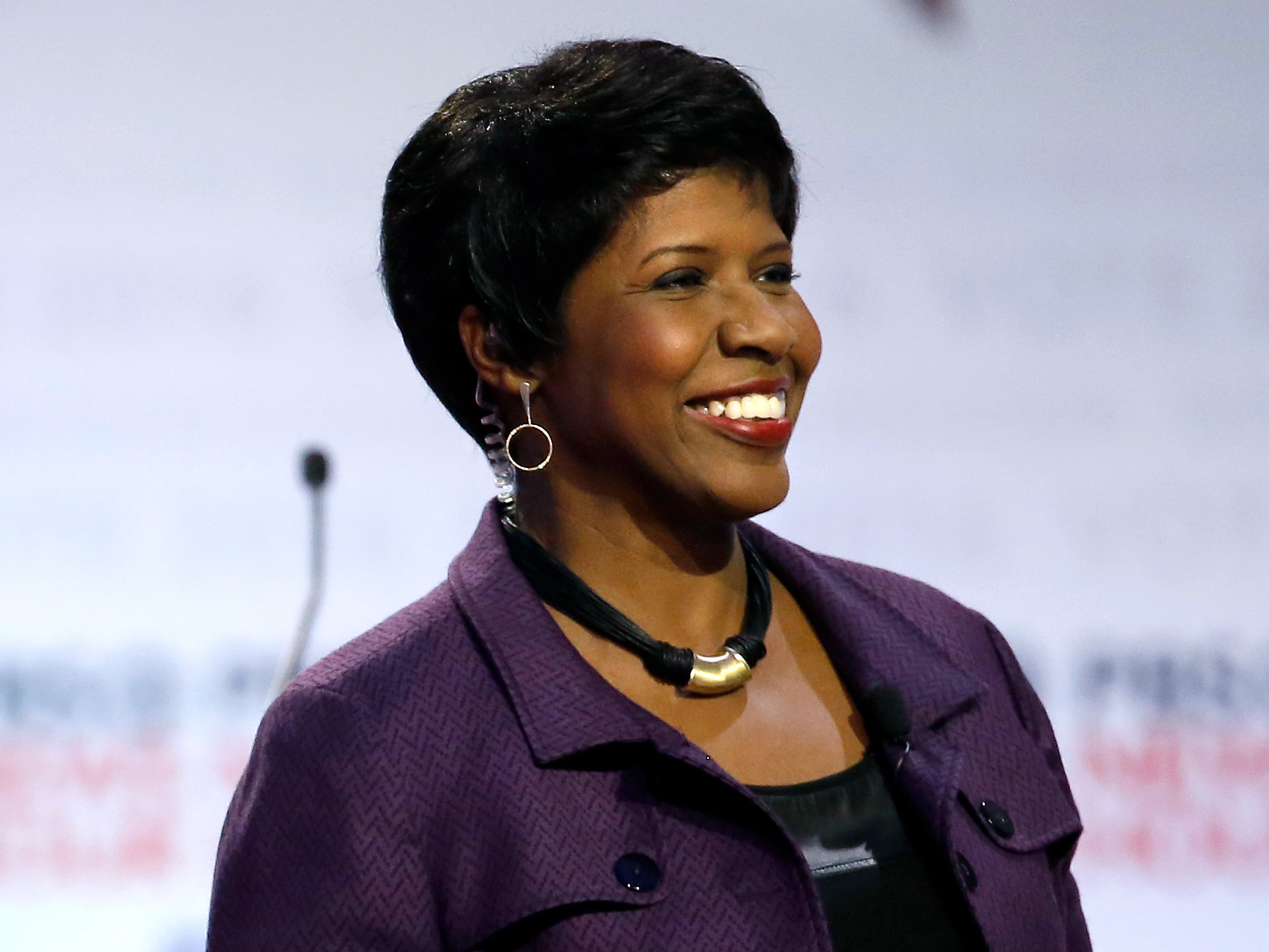Gwen Ifill takes the stage before moderating a Democratic presidential primary debate at the University of Wisconsin, Milwaukee in February.